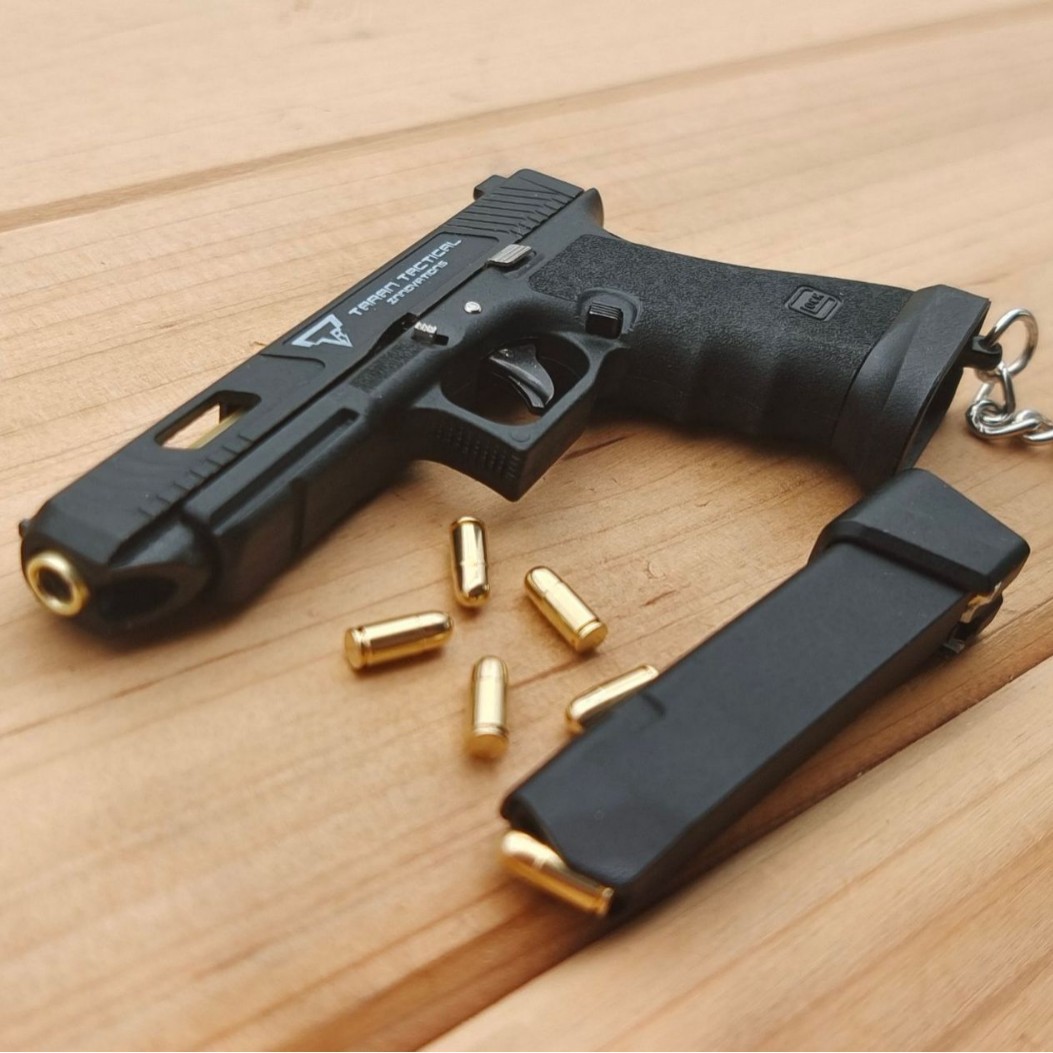 Mini modelo de pistola de jugu - Electronics Gadgets Sale reseña y precio